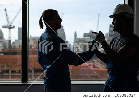 Handshake between engineer foreman manager and electrician Handshake between engineer foreman manager and electrician 103385024