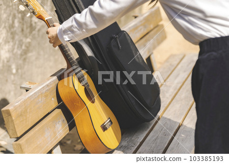 Guitar practice musical instrument case bench 103385193