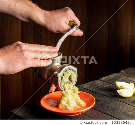 Process of grinding an apple on a grater. Baking ingredients, chef's hands  Stock Photo - Alamy