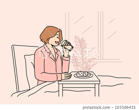 Happy woman enjoy breakfast in bed  103386435