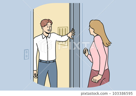 Smiling man hold lift doors to neighbor 103386595