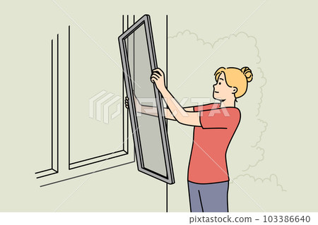 Woman put insect protection screen on window  103386640