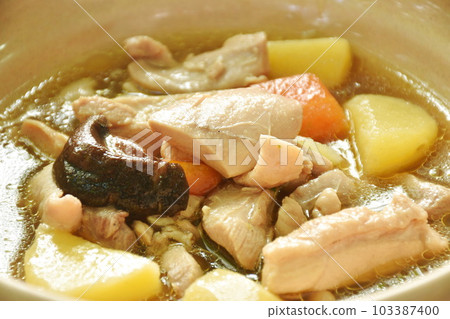 boiled chicken with potato and carrot in sweet red gravy sauce stew on bowl boiled chicken with potato and carrot in sweet red gravy sauce stew on bowl 103387400