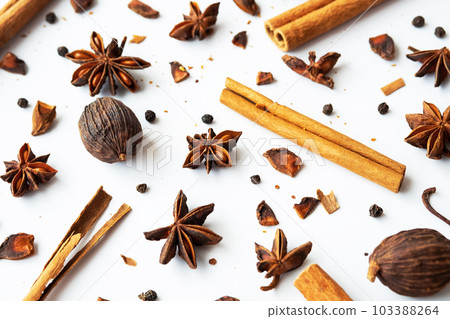 Dried star anise, cinnamon sticks and whole cardamon. Natural herbal spices seasoning collection. Dried star anise, cinnamon sticks and whole cardamon. Natural herbal spices seasoning collection. 103388264