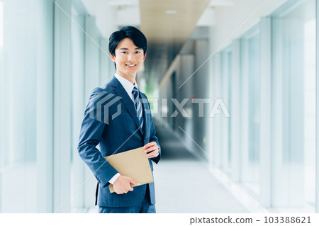 Young businessman in the office 103388621