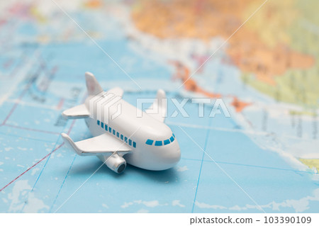 Airplane toy and world map Airplane toy and world map 103390109
