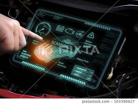 Mechanic is scanning electric engine trouble of EV electric vehicle by HUD digital display tool 103390827
