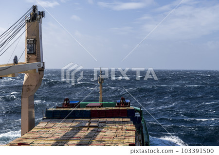 Beautiful seascape - waves and sky with clouds with beautiful lighting. Stormy sea, Bad weather. Gale. Rough sea. Beautiful seascape - waves and sky with clouds with beautiful lighting. Stormy sea, Bad weather. Gale. Rough sea. 103391500
