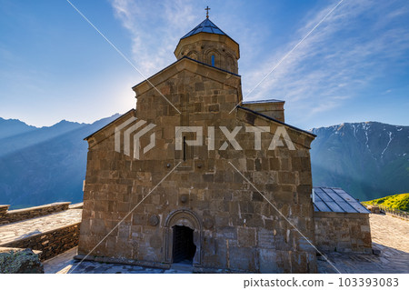 Gergeti Trinity Church near the Stepantsminda village in Georgia ,At an altitude of 2170 meters, under Mount Kazbek or Kazbegi, Gergeti Trinity Church near the Stepantsminda village in Georgia ,At an altitude of 2170 meters, under Mount Kazbek or Kazbegi, 103393083
