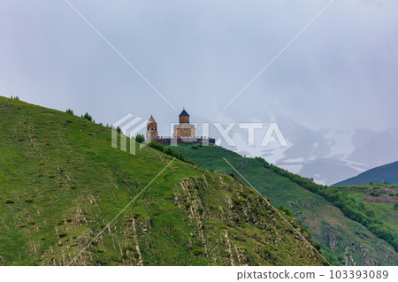 Gergeti Trinity Church near the Stepantsminda village in Georgia ,At an altitude of 2170 meters, under Mount Kazbek or Kazbegi, 103393089
