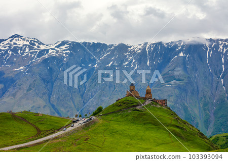 Gergeti Trinity Church near the Stepantsminda village in Georgia ,At an altitude of 2170 meters, under Mount Kazbek or Kazbegi, Gergeti Trinity Church near the Stepantsminda village in Georgia ,At an altitude of 2170 meters, under Mount Kazbek or Kazbegi, 103393094