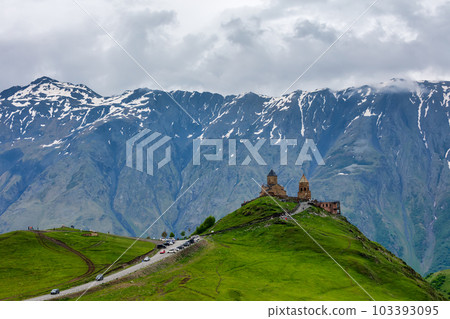 Gergeti Trinity Church near the Stepantsminda village in Georgia ,At an altitude of 2170 meters, under Mount Kazbek or Kazbegi, Gergeti Trinity Church near the Stepantsminda village in Georgia ,At an altitude of 2170 meters, under Mount Kazbek or Kazbegi, 103393095