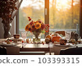 Seasonal table setting with pumpkins and flowers 103393315