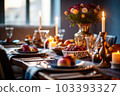 Seasonal table setting with pumpkins and flowers 103393327