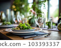 Romantic table setting with candles and flowers 103393337