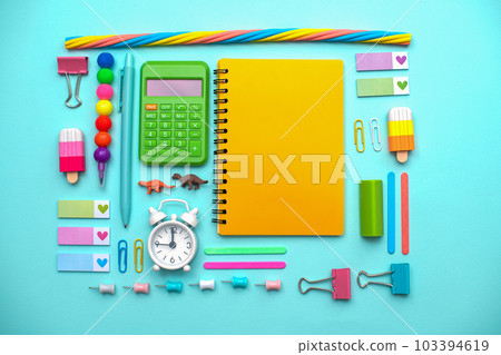 Different stationery.Top view of student table stationery and education supplies. Back to school. Different stationery.Top view of student table stationery and education supplies. Back to school. 103394619