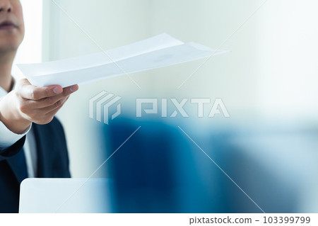 Businessman handing the document 103399799