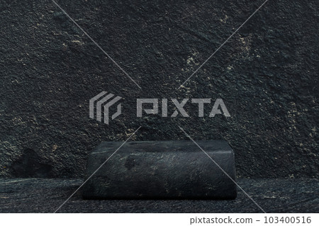 Black stone podium in cave, dark stone pedestal display background, 3D rendering Black stone podium in cave, dark stone pedestal display background, 3D rendering 103400516