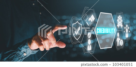 Corporate credibility improvement concept, Business person hand touching credibility icon on virtual screen. Corporate credibility improvement concept, Business person hand touching credibility icon on virtual screen. 103401051