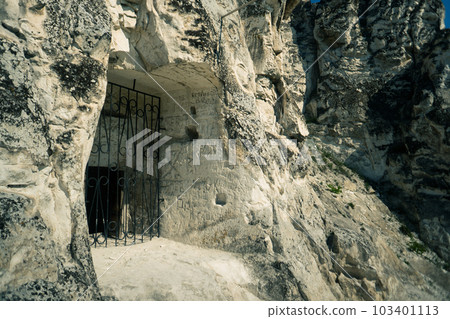 iron door inside the rock iron door inside the rock 103401113