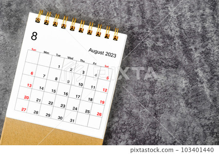 The August 2023 Monthly desk calendar for 2023 year on wooden table. 103401440