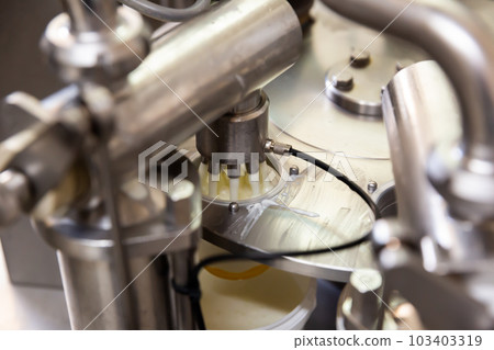 Closeup of milking facility on modern dairy farm 103403319