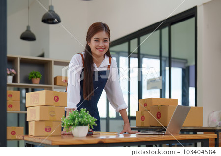 Small businesses SME owners female entrepreneurs working with parcel, e-business, marketing, online shop, sme, entrepreneurs 103404584