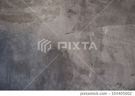 The texture of a gray stone wall with lightened spots. An overlay for your design with copy space. High quality photo The texture of a gray stone wall with lightened spots. An overlay for your design with copy space. High quality photo 103405002