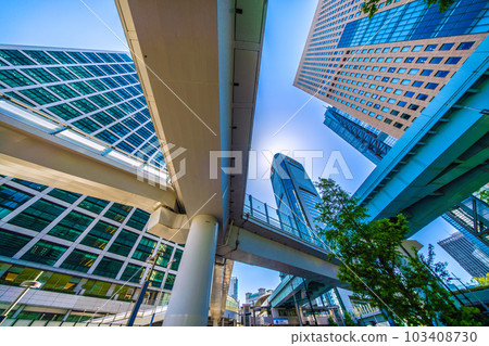 Tokyo cityscape in Japan Cheerful like summer... Intersecting decks... Overlooking Shiodome Station and Shiodome's business district Tokyo cityscape in Japan Cheerful like summer... Intersecting decks... Overlooking Shiodome Station and Shiodome's business district 103408730