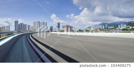 Highway overpass motion blur with city Highway overpass motion blur with city 103409275