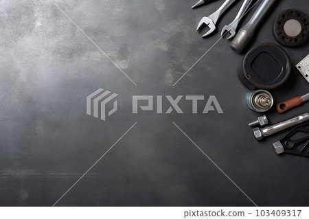 Auto mechanic's tools on grey stone table with copy space Auto mechanic's tools on grey stone table with copy space 103409317