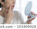 woman taking care of wrinkles 103409428