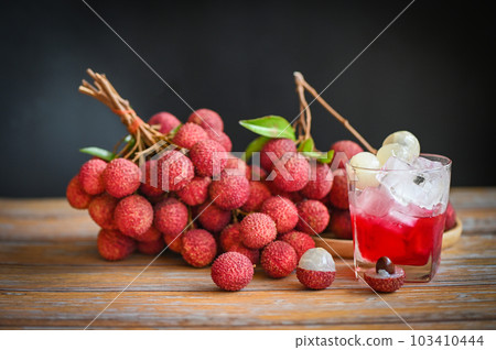 lychees on table, fresh ripe lychee fruit tropical fruit lychee juice drink with sweet soda in glass - lychee smoothie food and drink fruit juice 103410444