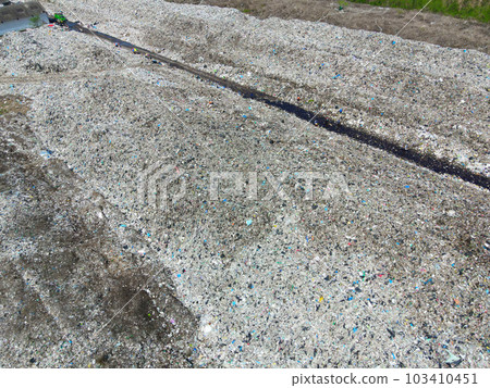 Aerial view landfill garbage waste huge dump environmental pollution problem, Top view on plastic and other industrial waste ecological disaster from above with garbage sorting garbage disposal Aerial view landfill garbage waste huge dump environmental pollution problem, Top view on plastic and other industrial waste ecological disaster from above with garbage sorting garbage disposal 103410451
