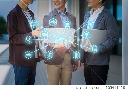 An engineer having a meeting while operating a personal computer in the office Photography cooperation "LINK FOREST" 103411428
