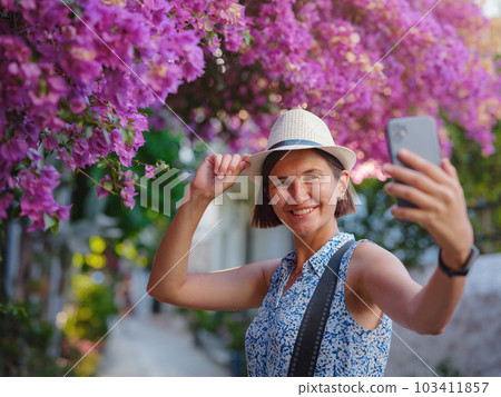 Blooming bougainvillea, streets of the old town of Bodrum, Turkey 103411857