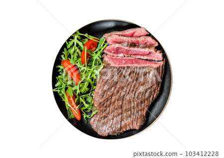 Grilled medium rare flank beef steak with salad in a plate. Isolated on white background. 103412228