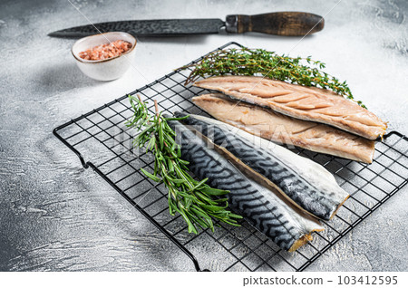 Fresh sliced mackerel fillet fish. White background. Top view Fresh sliced mackerel fillet fish. White background. Top view 103412595