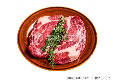 Raw Chuck eye roll steaks organic beef meat. Isolated on white background. 103412727