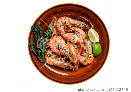 Roasted giant tiger shrimps Prawns on a plate. Isolated on white background. Roasted giant tiger shrimps Prawns on a plate. Isolated on white background. 103412749
