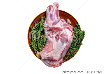 Whole fresh Raw lamb shoulder meat on a plate. Isolated on white background. 103412921
