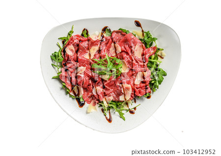 Beef carpaccio on white plate with parmesan cheese and arugula. Isolated on white background. Beef carpaccio on white plate with parmesan cheese and arugula. Isolated on white background. 103412952