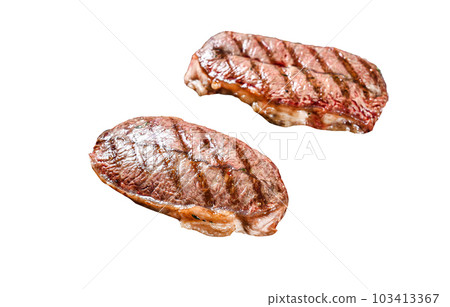 Grilled meat Top Blade steaks in a frying pan. Isolated on white background. Grilled meat Top Blade steaks in a frying pan. Isolated on white background. 103413367