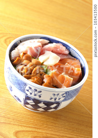 Seafood rice bowl with tuna, salmon, sea bream, scallop and sea urchin Seafood rice bowl with tuna, salmon, sea bream, scallop and sea urchin 103413500