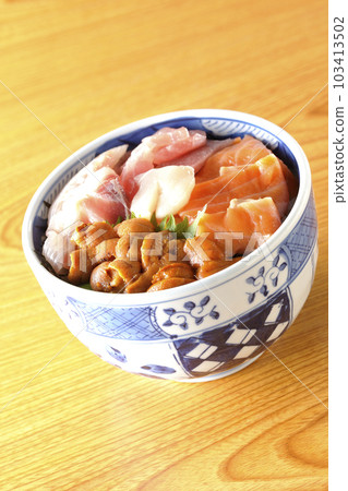 Seafood rice bowl with tuna, salmon, sea bream, scallop and sea urchin 103413502