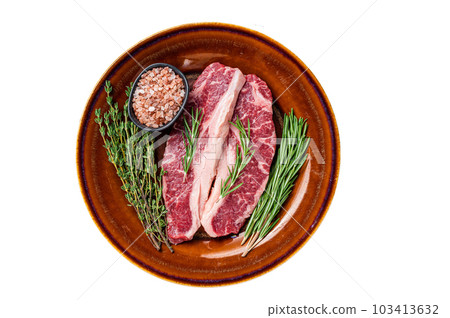 Two sliced Raw Striploin steaks or New York steaks, beef meat. Isolated on white background. Two sliced Raw Striploin steaks or New York steaks, beef meat. Isolated on white background. 103413632