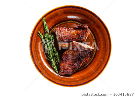 Grilled BBQ veal calf short spare rib meat on plate. Isolated on white background. Grilled BBQ veal calf short spare rib meat on plate. Isolated on white background. 103413657