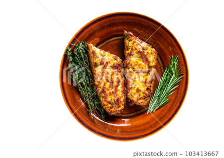 Hot baked sandwich on Baguette bread with ham, bacon, vegetables and cheese on a rustic plate. Isolated on white background. 103413667