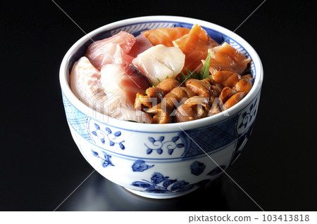 Shoot tuna, salmon, sea bream, scallop, and sea urchin on a black background Shoot tuna, salmon, sea bream, scallop, and sea urchin on a black background 103413818