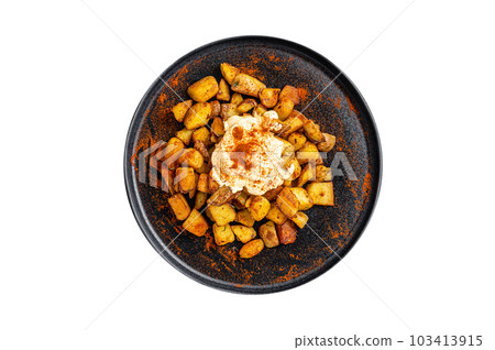 Patatas Bravas, traditional Spanish tapas, baked potato with spicy tomato sauce. Isolated on white background. Patatas Bravas, traditional Spanish tapas, baked potato with spicy tomato sauce. Isolated on white background. 103413915